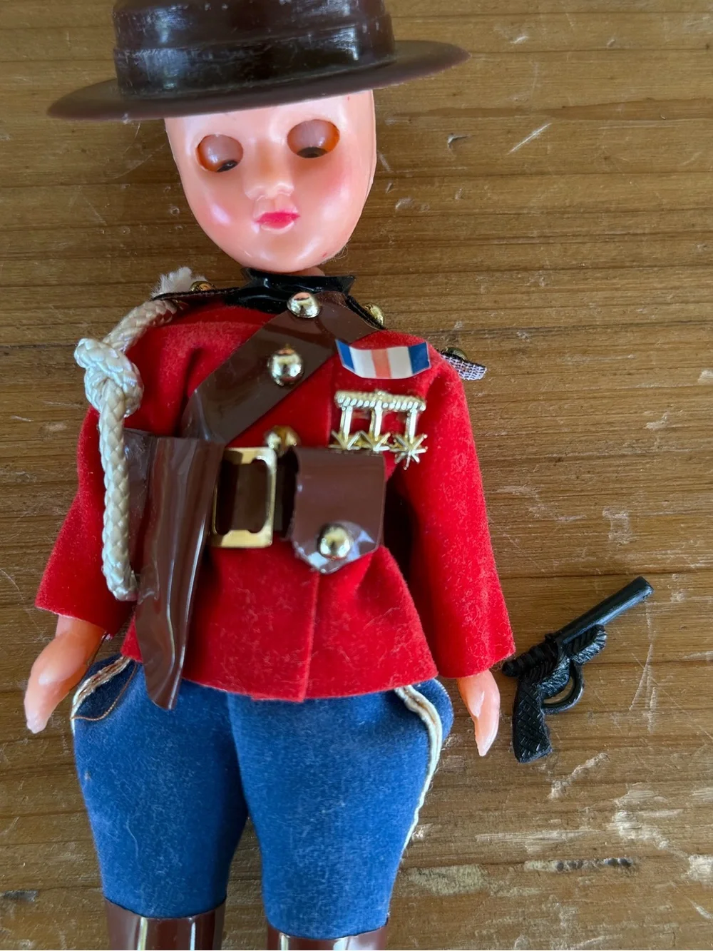 Vintage-Inspired Red Mountie Doll Toy with Blue Pants